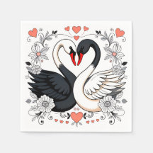 Schwarze und weiße Schwäne, umgeben von Blumendesi