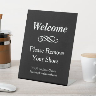 Schwarze Willkommen-Wifi-Schuhe-Ausziehen Sockelschild