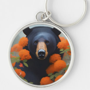 Schwarzer Bär in orangen Blume Schlüsselanhänger