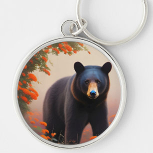 Schwarzer Bär in orangen Blume Schlüsselanhänger