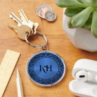 Schwarzer Blumenkreislauf Metallischer blauer Hint