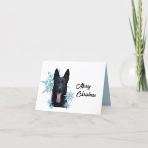 Schwarzer Deutscher Schäferhund in den Schneeflock Feiertagskarte