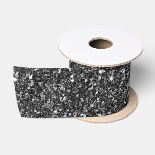 Schwarzer Hintergrund mit falschem Glitterdruck Satinband