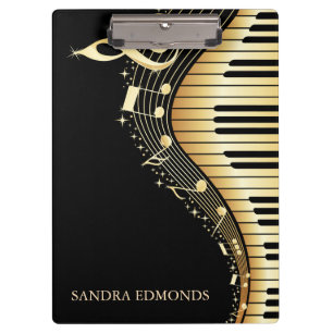 Schwarzer Hintergrund und Gold-Tastatur Klemmbrett