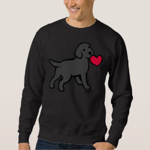 Schwarzer Labrador Welpe mit einem kleinen Herz Sweatshirt