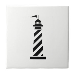 Schwarzer Leuchtturm auf weißer Keramik-Fliese Fliese