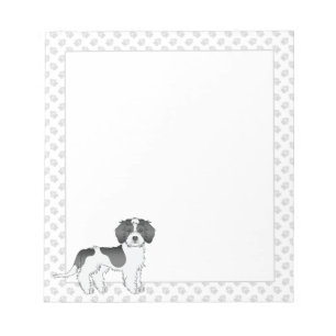 Schwarzer Parti-Farben-Mini-Goldendoodle-Hund & Pf Notizblock