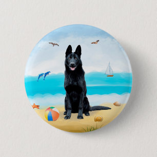 Schwarzer Schäferhund am Strand Button