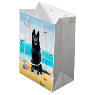 Schwarzer Schäferhund am Strand Mittlere Geschenktüte