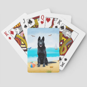 Schwarzer Schäferhund am Strand Spielkarten