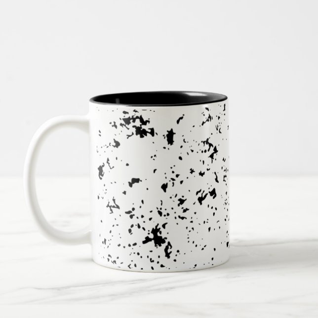 Schwarzer Spritzer Art  Zweifarbige Tasse (Links)
