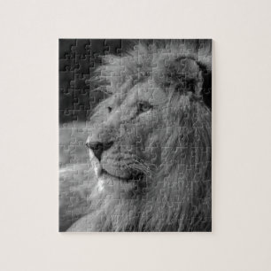 Schwarzer u. weißer Löwe - wildes Tier Puzzle
