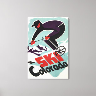 Schwarzer und lila gekleideter Skier Leinwanddruck