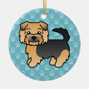 Schwarzer und Tan Norfolk Terrier Hund auf blau Keramikornament