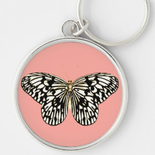 Schwarzer und weißer Schmetterling, korallenrosa H Schlüsselanhänger