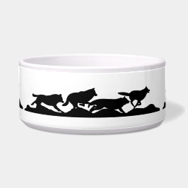 Schwarzer Wolf Silhouette Wild läuft mit dem Pack Napf