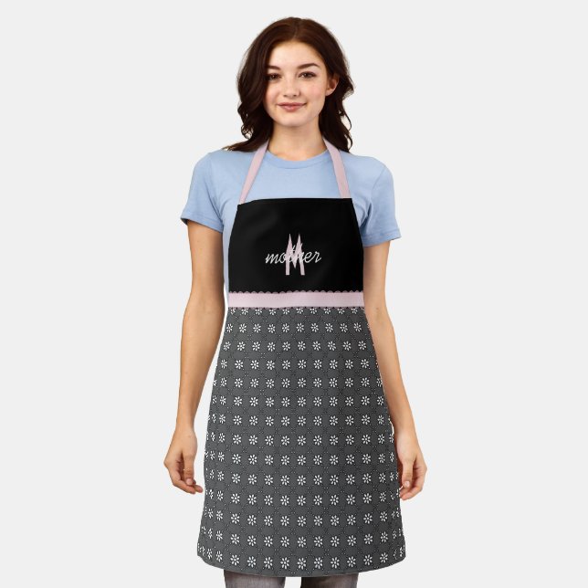 Schwarzes Auge mit rosa Monogramm Schürze (Getragen)