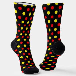 Schwarzes Design mit roten und gelben Tupfen Socken