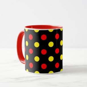 Schwarzes Design mit roten und gelben Tupfen Tasse