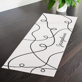 Schwarzes geometrisches Schleifenmuster auf weißem Yogamatte