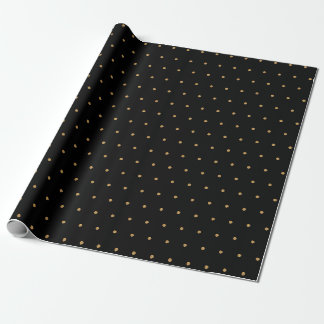 Schwarzes Geschenkpapier mit goldenen Tupfen