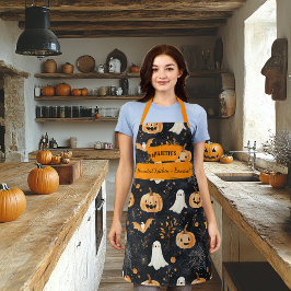 Schwarzes Halloween mit Gespenstern, Pumpkins und Schürze