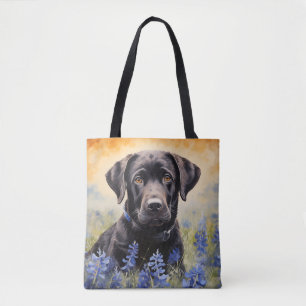 Schwarzes Labrador in Bluebonnets