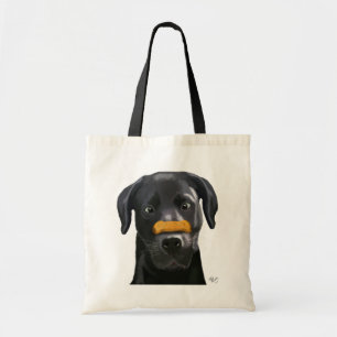 Schwarzes Labrador mit dem Knochen auf Nase 2 Tragetasche