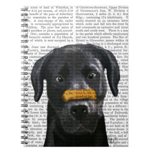 Schwarzes Labrador mit dem Knochen auf Nase Notizblock