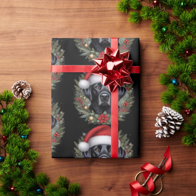 Schwarzes Labrador mit festlicher Weihnachtsmannmü Geschenkpapier (Feiertagsgeschenk)