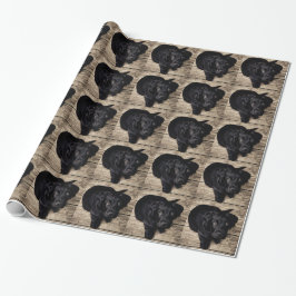 Schwarzes Labrador Retriever Welpe auf Holz Geschenkpapier