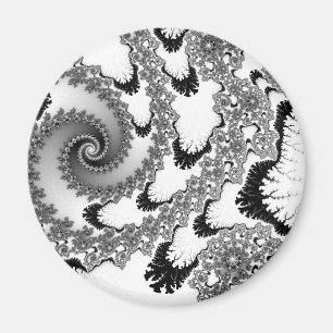 Schwarzes leckt Magneten auf Magnet