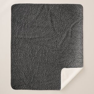 Schwarzes Leder: nahtlose Nahtstruktur. Sherpadecke