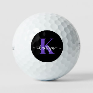 Schwarzes lila Schriftmonogramm Golfball