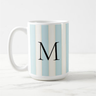 Schwarzes Monogramm auf blauem und antikem weißem Kaffeetasse