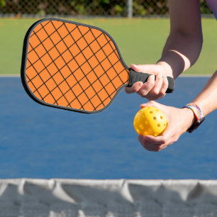 Schwarzes Netzgewebe auf orangefarbenem Paddel Pickleball Schläger