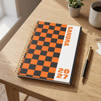 Schwarzes orangefarbenes Retro-Schachbrett mit ind Planer