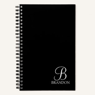 Schwarzes personalisiertes Schriftmonogramm und Na Notizbuch
