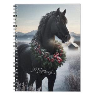 Schwarzes Pferd im Schnee mit Weihnachtskranz Notizblock