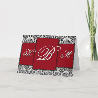 Schwarzes, rotes und weißes Damastmonogramm