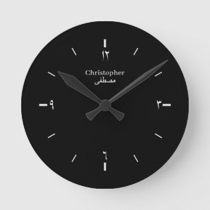 Schwarzes Uhrzifferblatt mit arabischen Ziffern in Runde Wanduhr