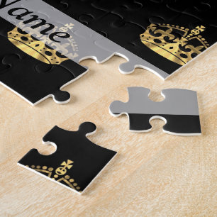 Schwarzes und Goldkronenmuster Puzzle