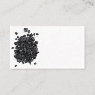 Schwarzkohle abgeschieden auf weißem Hintergrund.  Visitenkarte