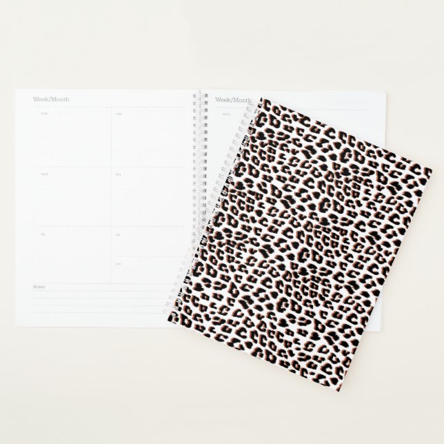 Schwarzweißdruck und Weißleopard Planer (Anzeige)