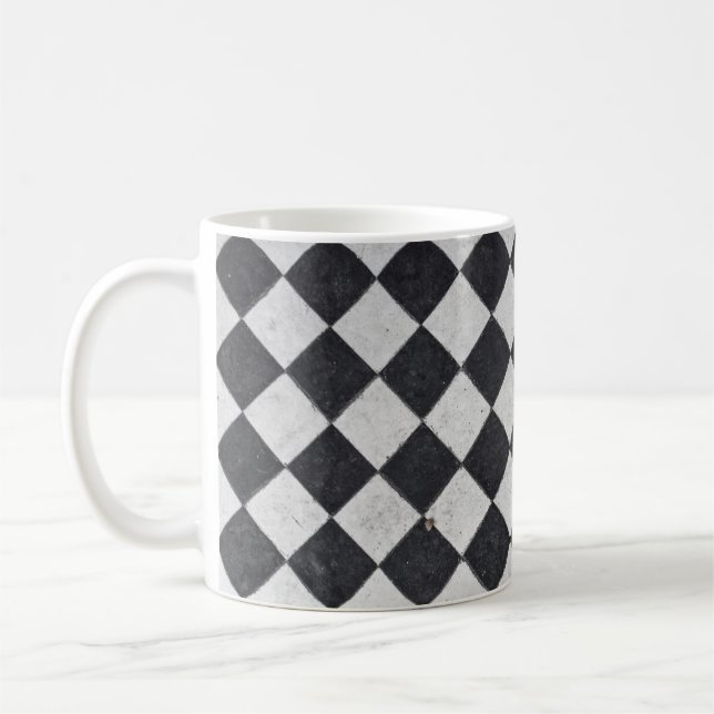 Schwarzweißharlequin-Grafik Kaffeetasse (Links)