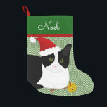 Schwarzweißkatze Personalisiert Kleiner Weihnachtsstrumpf<br><div class="desc">Erstellen Sie einen personalisierten Strumpf für Ihr Pelzkind. Dieses Design besteht aus einer kurzen Haar schwarz-weiß Katze mit einer Weihnachtsmannmütze in Weihnachtsfarben mit der Fähigkeit,  auf Ihre Bedürfnisse anpassen. Die Farbe des Hintergrunds und des Textes kann auf Wunsch geändert werden. Originelles Design von Night Owl's Menagerie,  2020.</div>