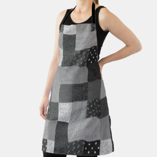 Schwarzweißquadrate mit Vintagem Patchwork Schürze