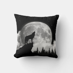 Schwarzweißwolf heult auf dem Mond Kissen