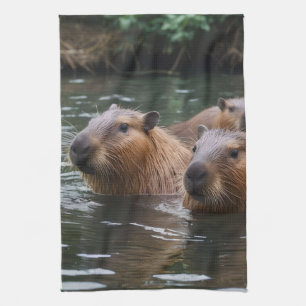Schwimmen der Capybaras im Fluss, Geschirrtuch