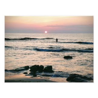 Schwimmer bei Sonnenuntergang Fotodruck
